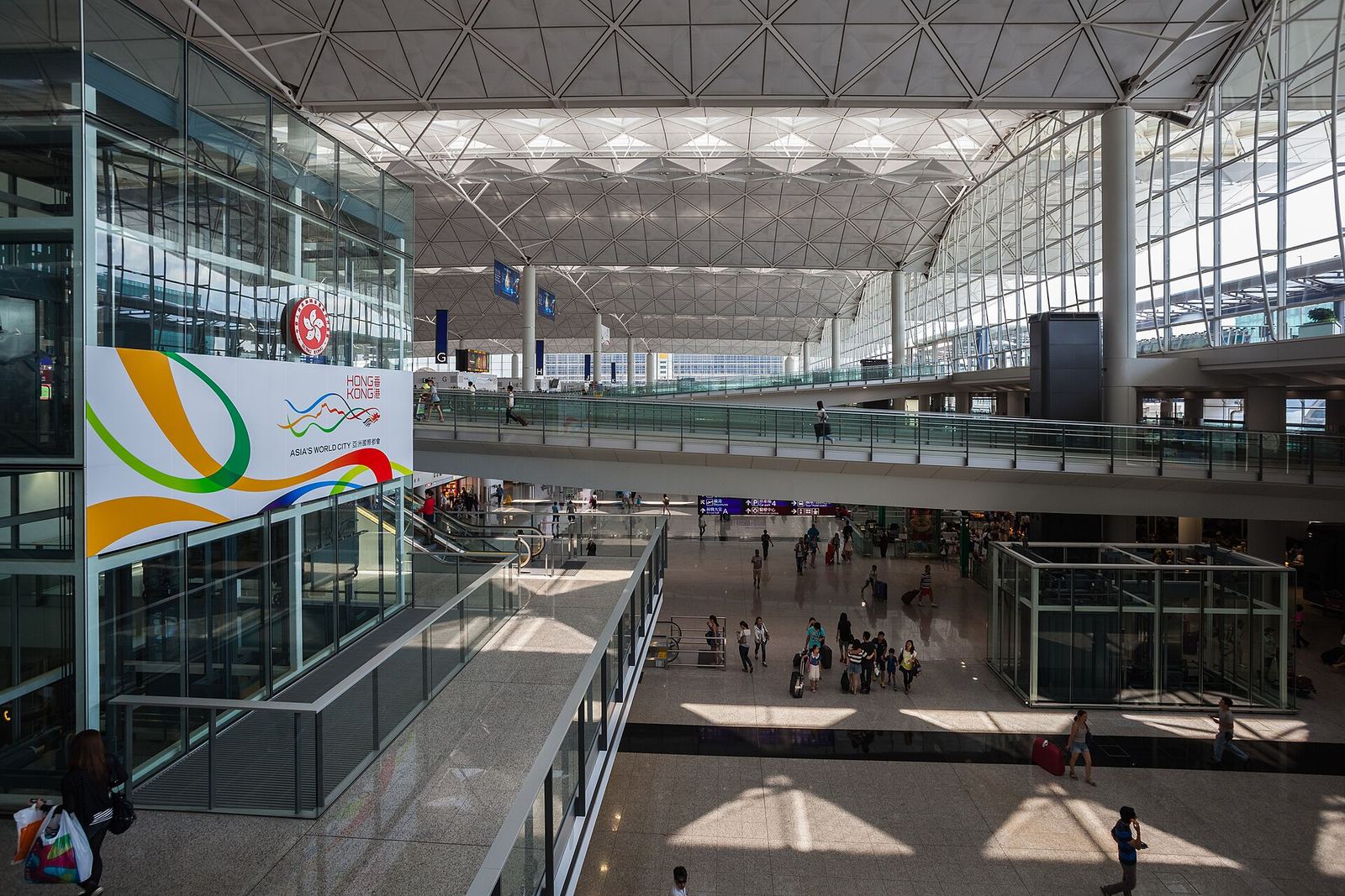 Bright, airy departure hall of Hong Kong International Airport Terminal 1 seen from above